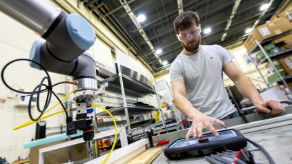 Students at the Advanced Manufacturing Center work with instructors like John Belding to get hands on experience with the latest technology innovations in the Engineering field.