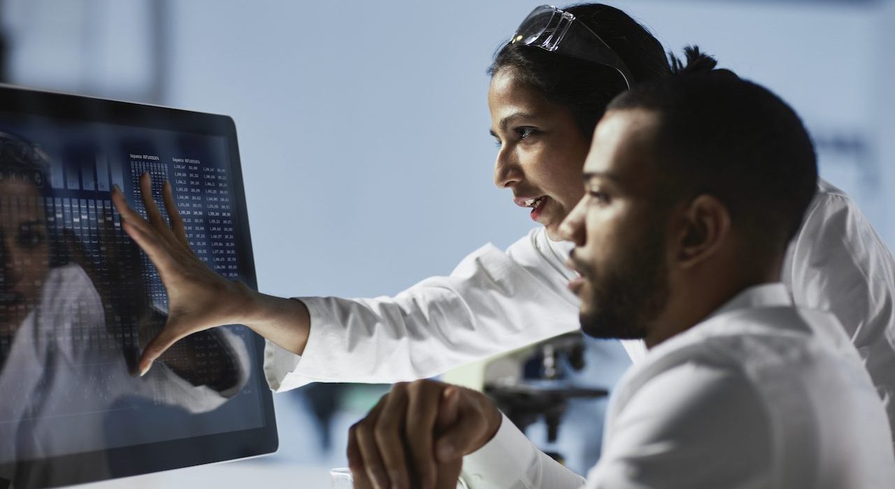 Scientists Working on Computer