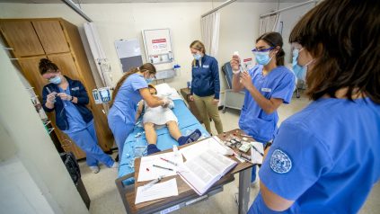 Nursing Students learning in a lab
