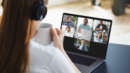 Online learning or business meeting, remote work using a laptop computer via video call. Successful caucasian freelancer woman takes part in video conference with employees. Distant working, online learning at home
