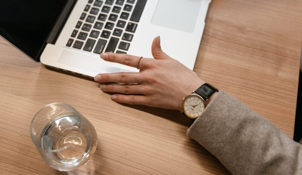 A stock photo of a hand on a laptop