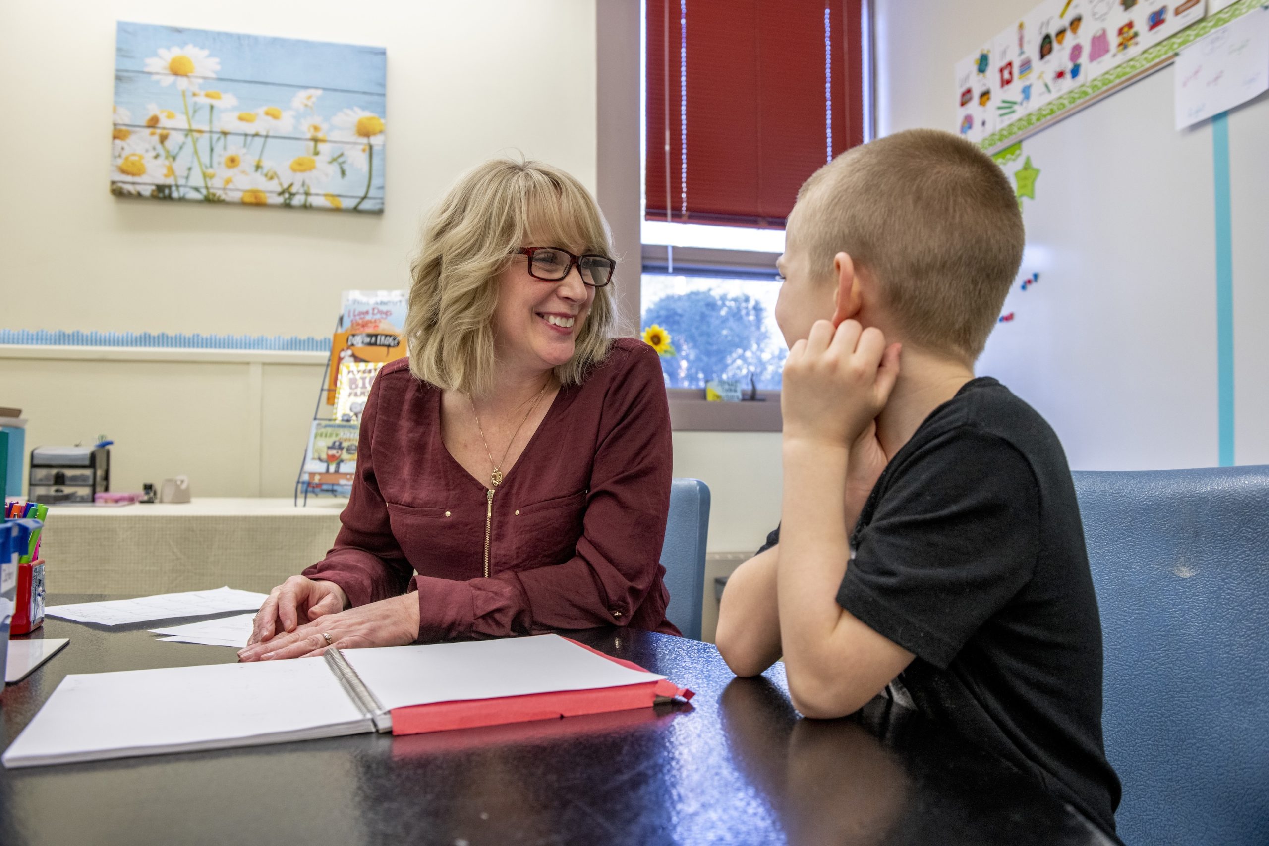 Teacher and student in a classroom