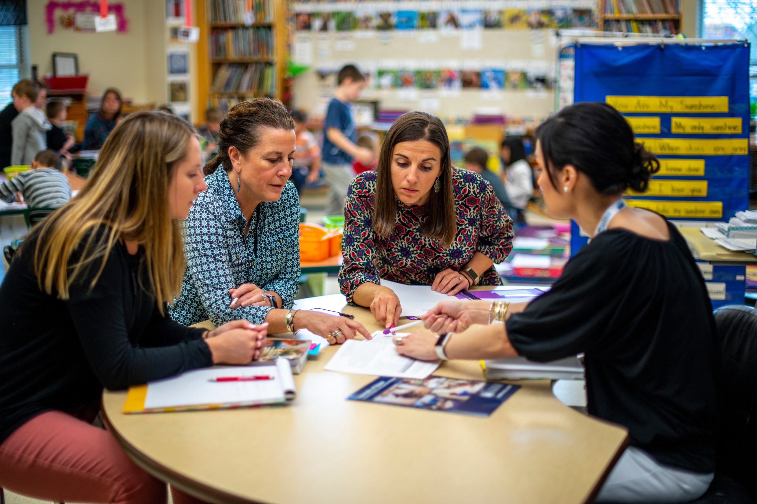 Teachers working together in a classroom