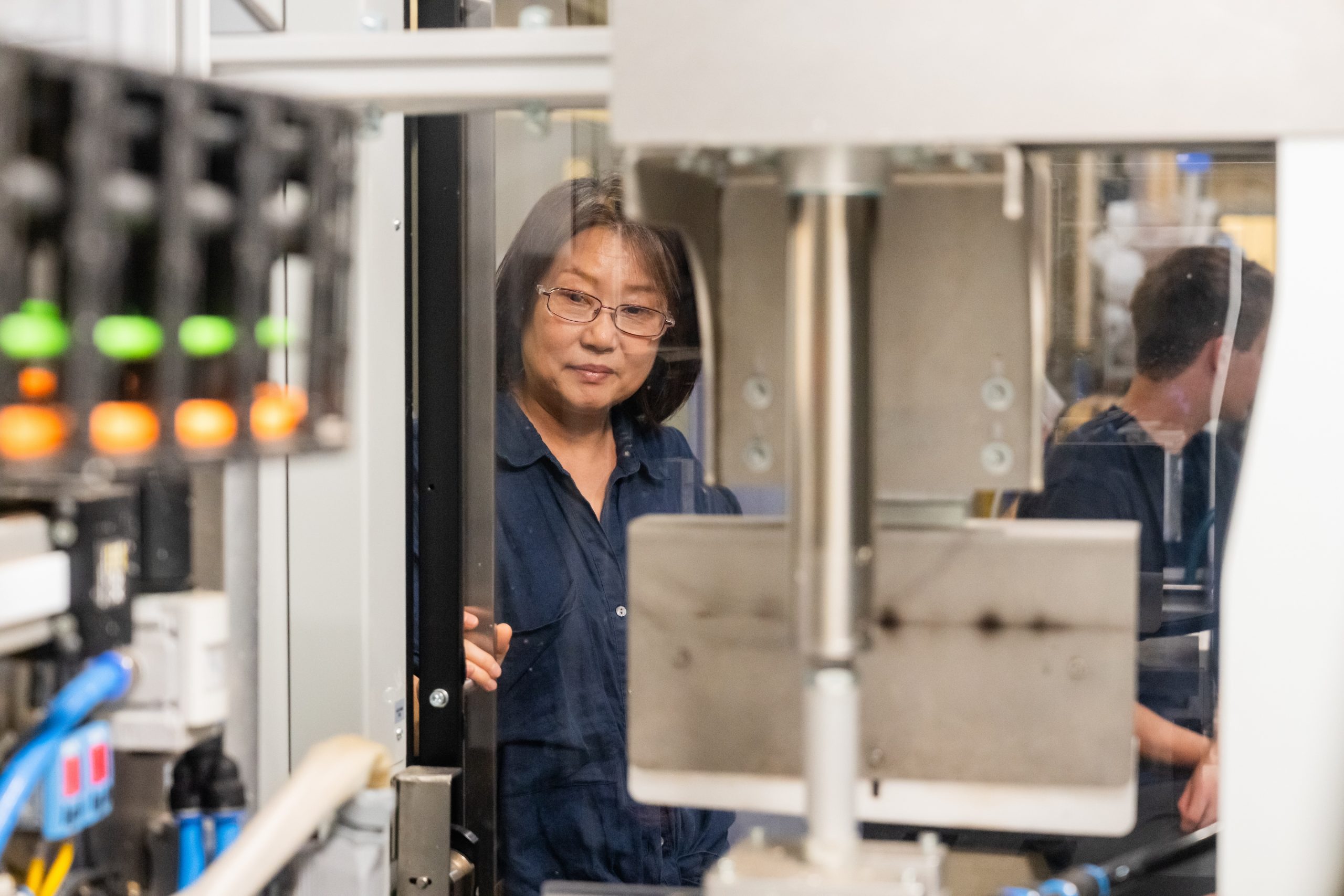 Person working with a paper plate machine