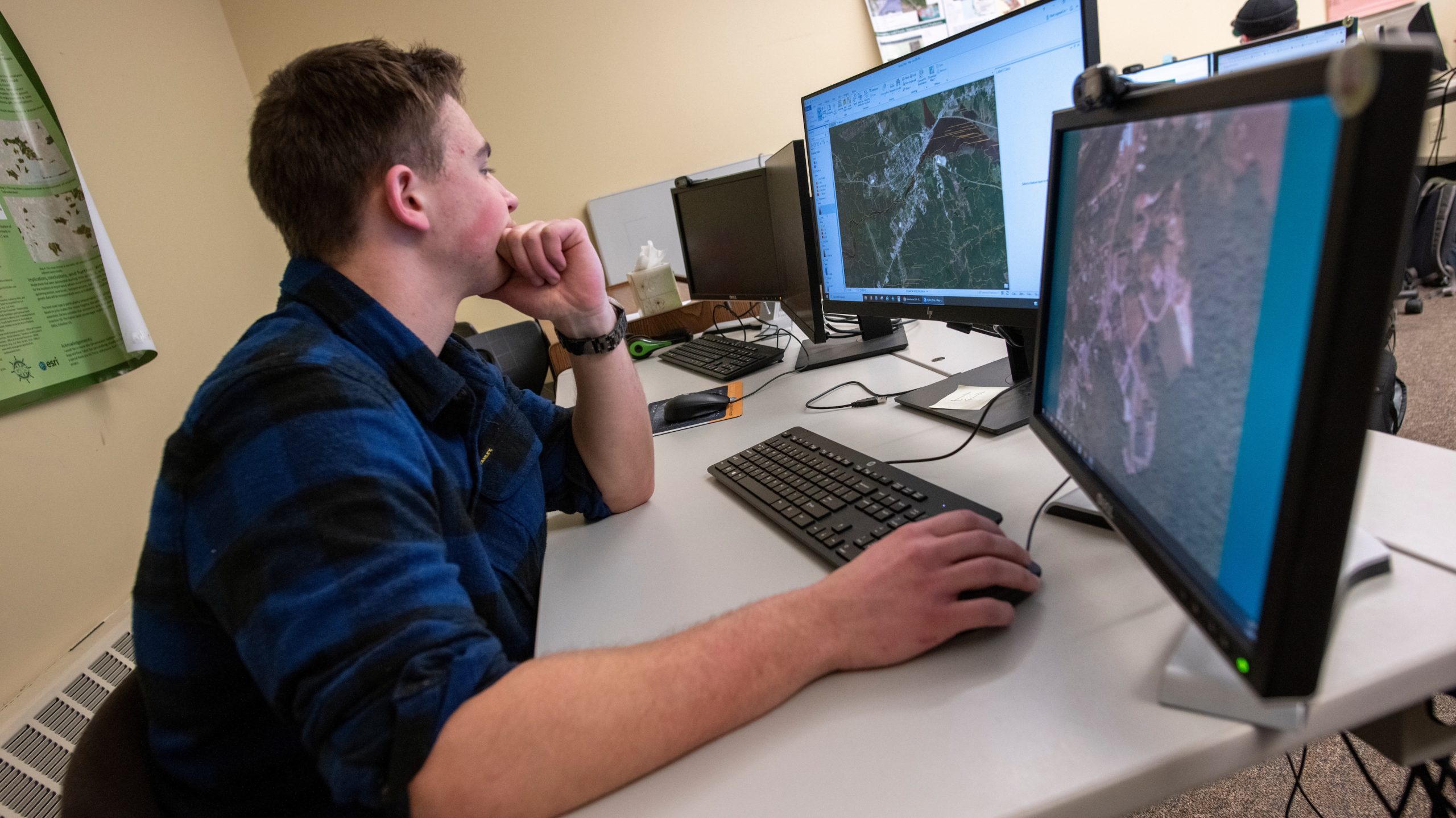 Student taking a class on geographic information systems