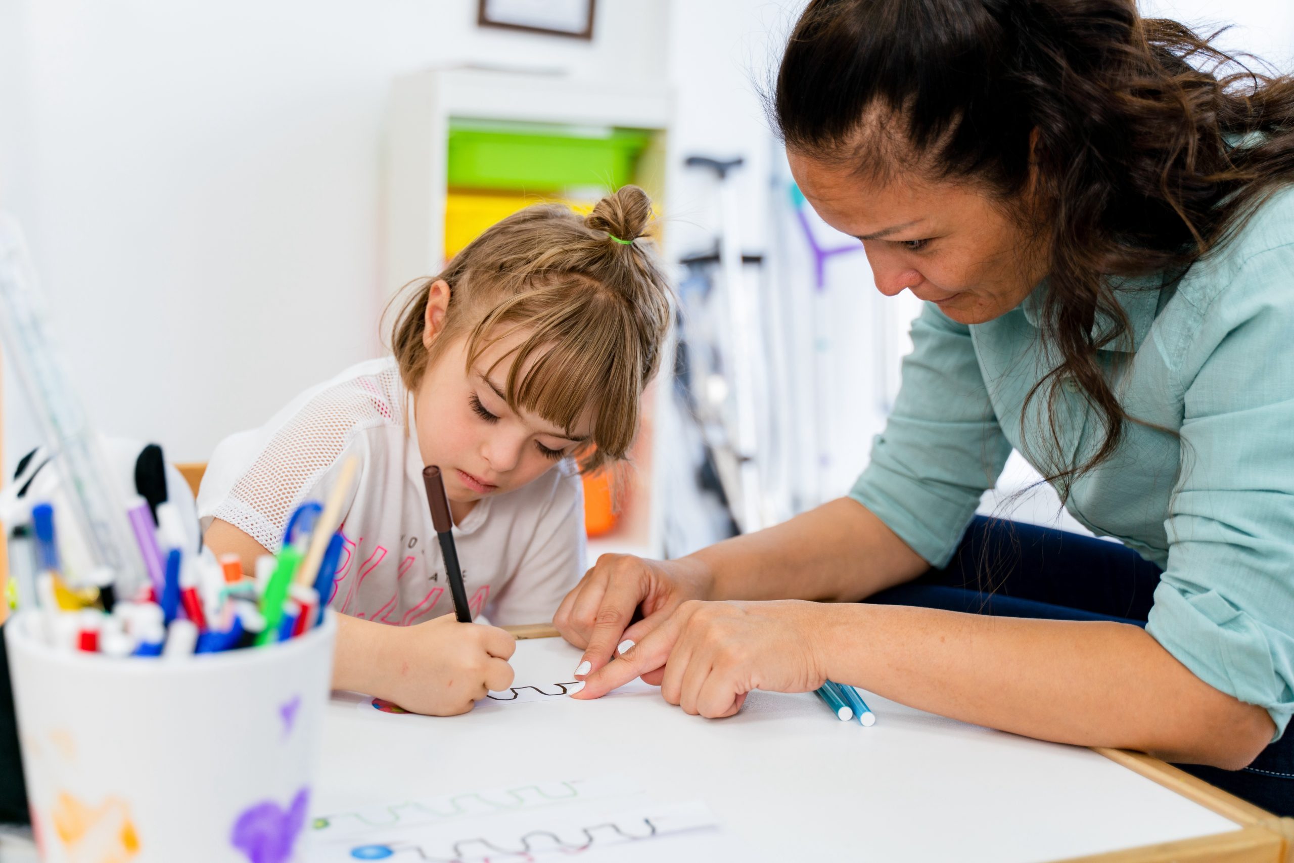 Teacher working with student with special needs