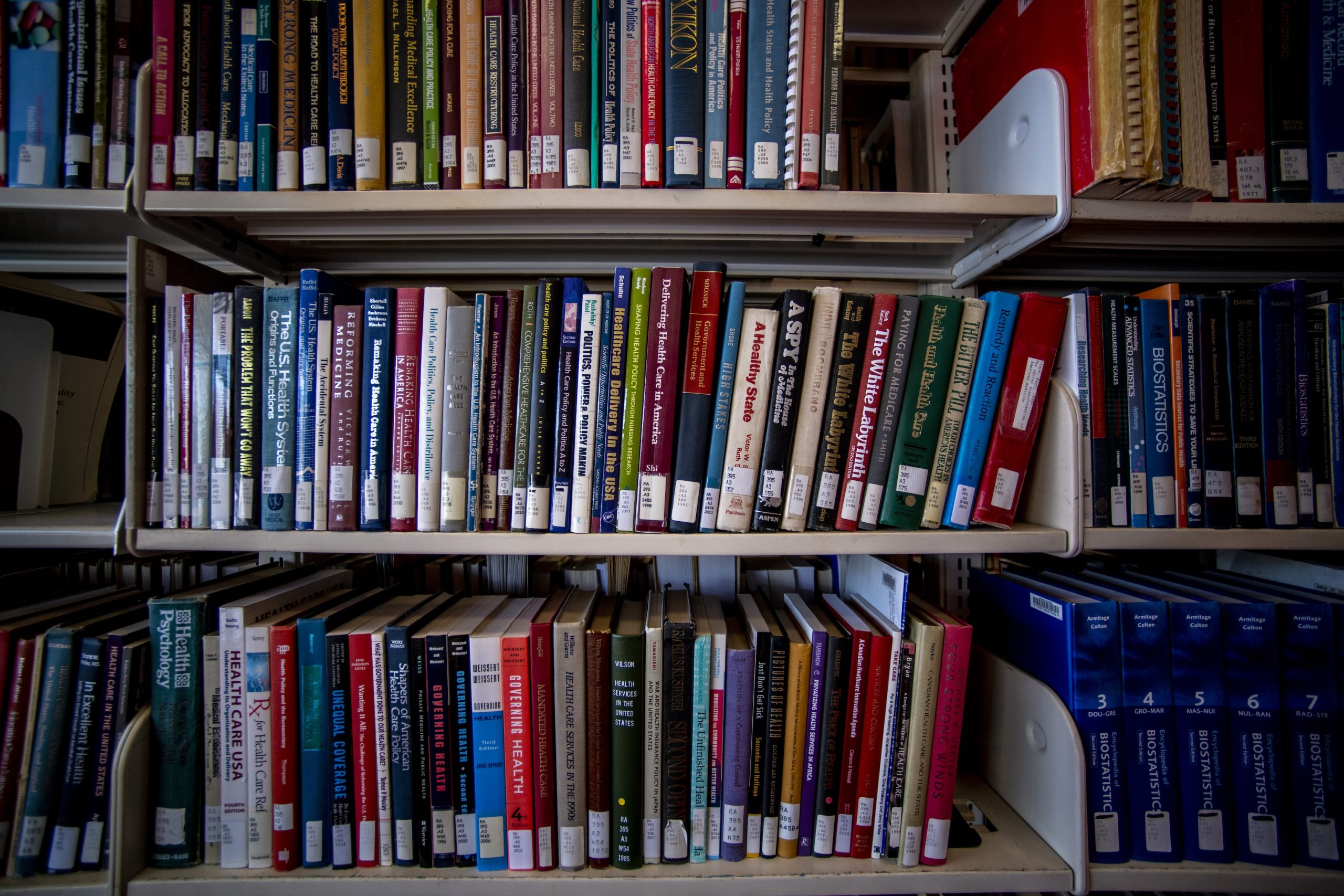 Books on a shelf in a library