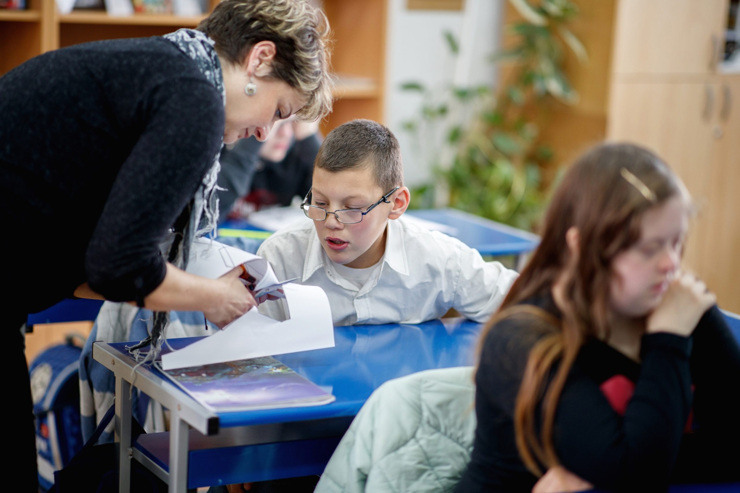 Teacher working with special needs students